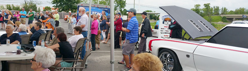 Crowds gather for a BBQ Party Luncheon featuring our Camaro Car-B-Q